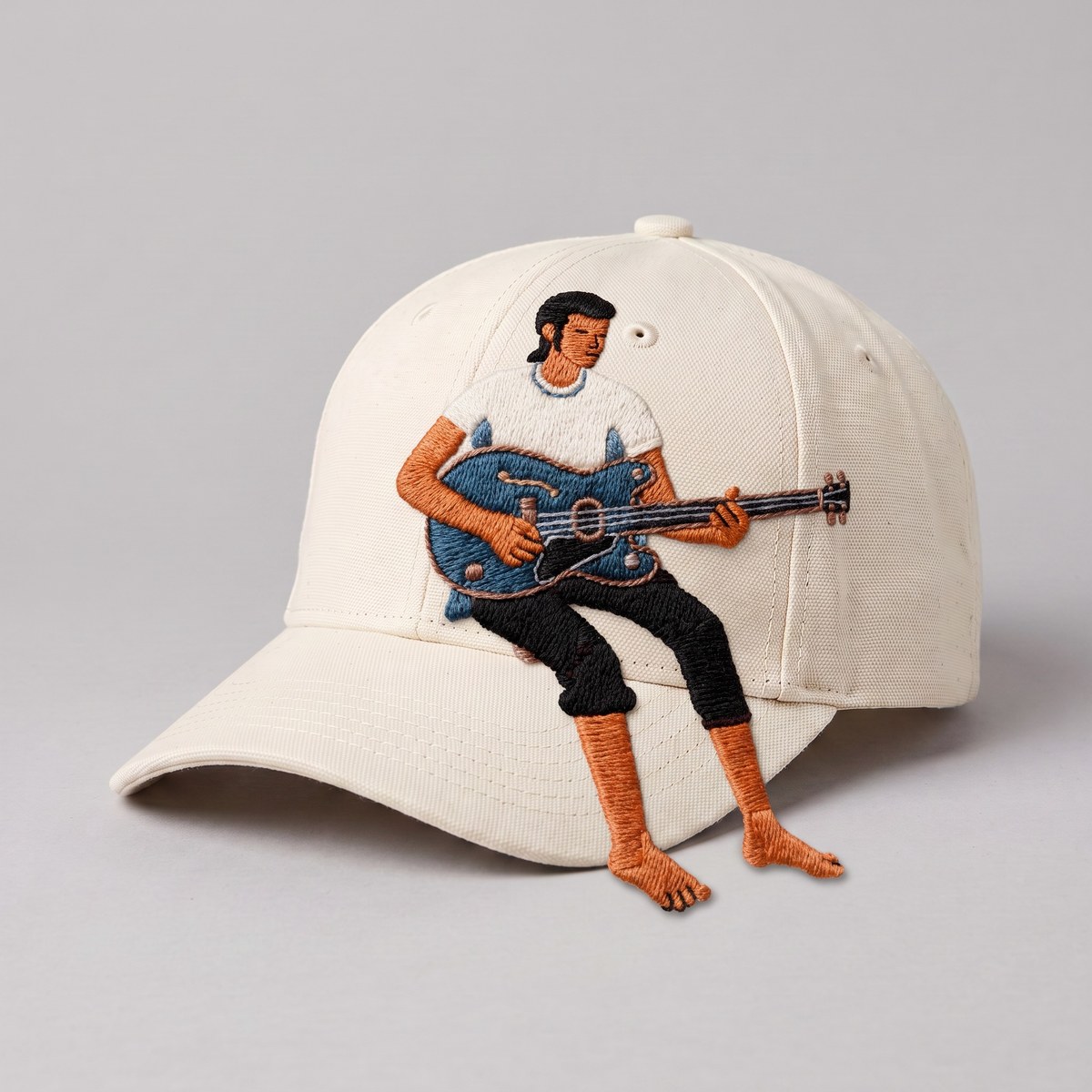Embroidered cap — guitarist in the jungle